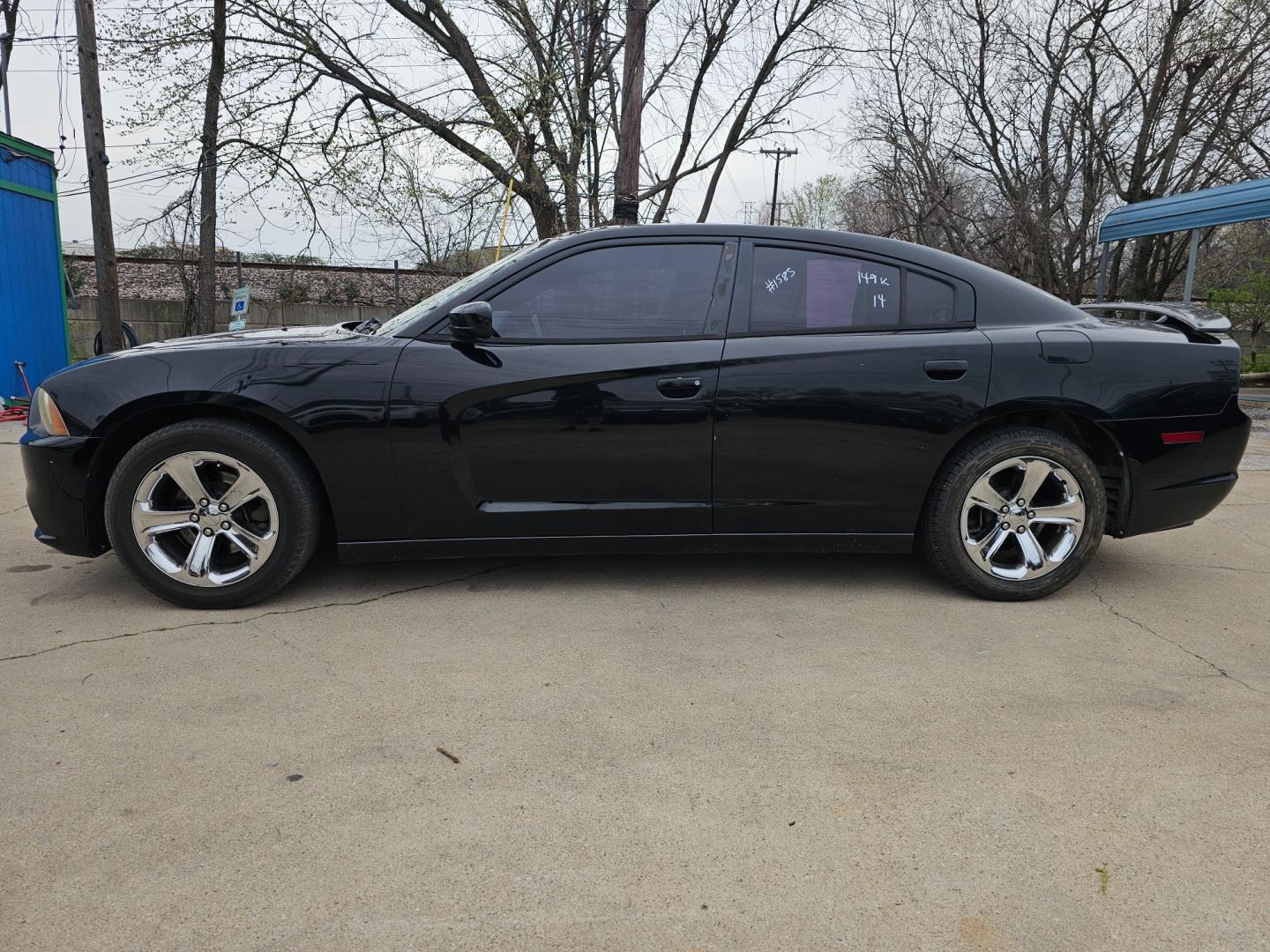 2014 Black Dodge Charger SE (2C3CDXBG6EH) with an 3.6L V6 DOHC 24V engine, 5-Speed Automatic transmission, located at 2020 East Division Street, Arlington, TX, 76011, (817) 801-3191, 32.742390, -97.076874 - Premiere Buy Here Pay Here with NO Credit Check (score) at 2020 East Division Street, Arlington, Texas, located in the center of the Dallas/Fort Worth metro area. For in-house financing in Lancaster, Waxahachie, Cleburne, Sherman, Denton, McKinney, Waco, Weatherford, Grand Prairie to Plano (along wi - Photo#0